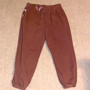 4 different pair of American eagle joggers.